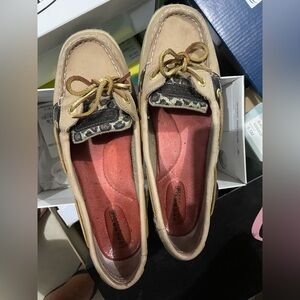 Sperry Cheetah print boat shoes.